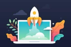 Spaceship rocket taking off from laptop startup development idea process.